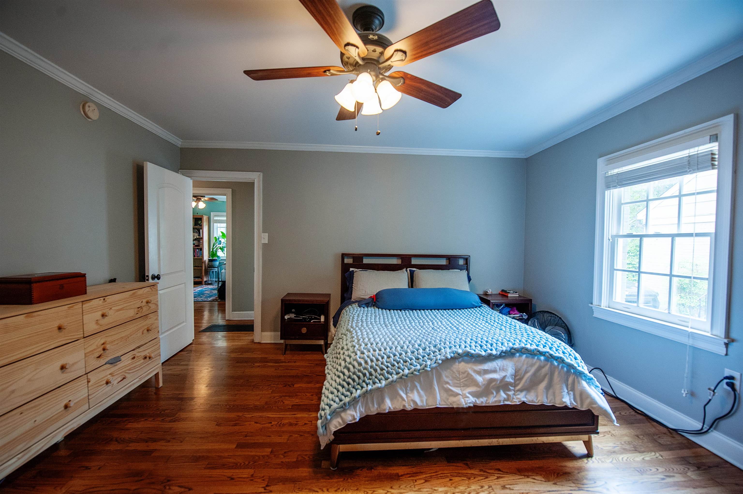 3640 Aurora Circle Memphis, TN 38111 - Photo 15 of 24 a bedroom with a bed and a chandelier