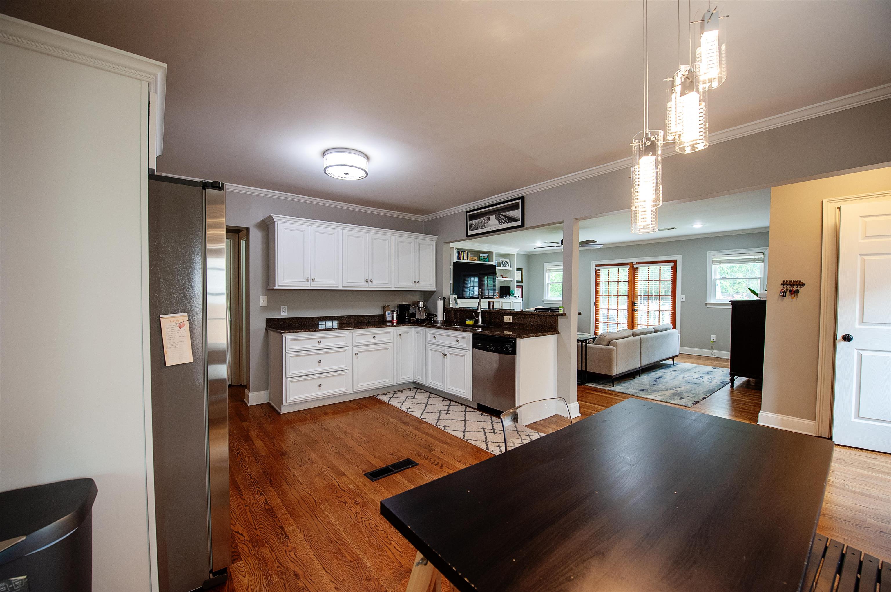 3640 Aurora Circle Memphis, TN 38111 - Photo 8 of 24 a kitchen with sink cabinets and stainless steel appliances