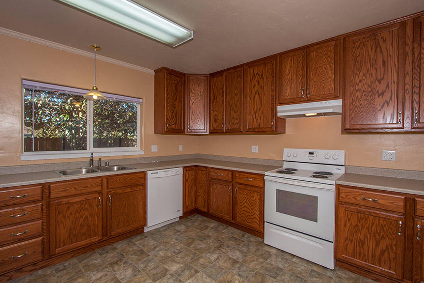 1732 Ash Street Fortuna, CA 95540 - Photo 8 of 37 a kitchen with a sink stove and cabinets