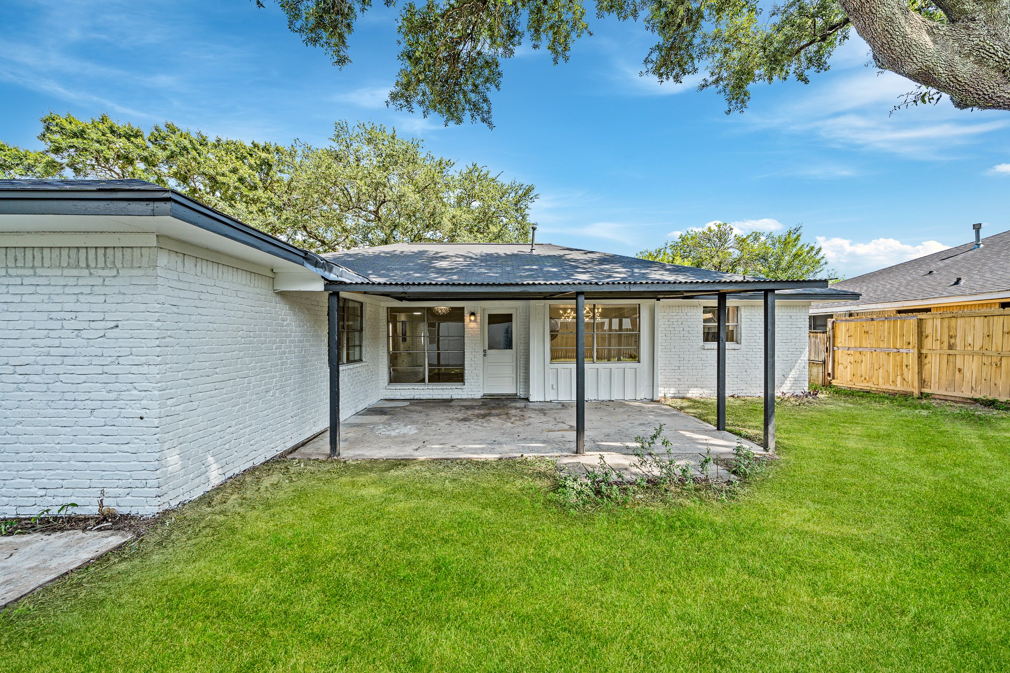 111 Princess Drive Houston, TX 77034 - Photo 27 of 30 a view of a house with a yard and sitting area