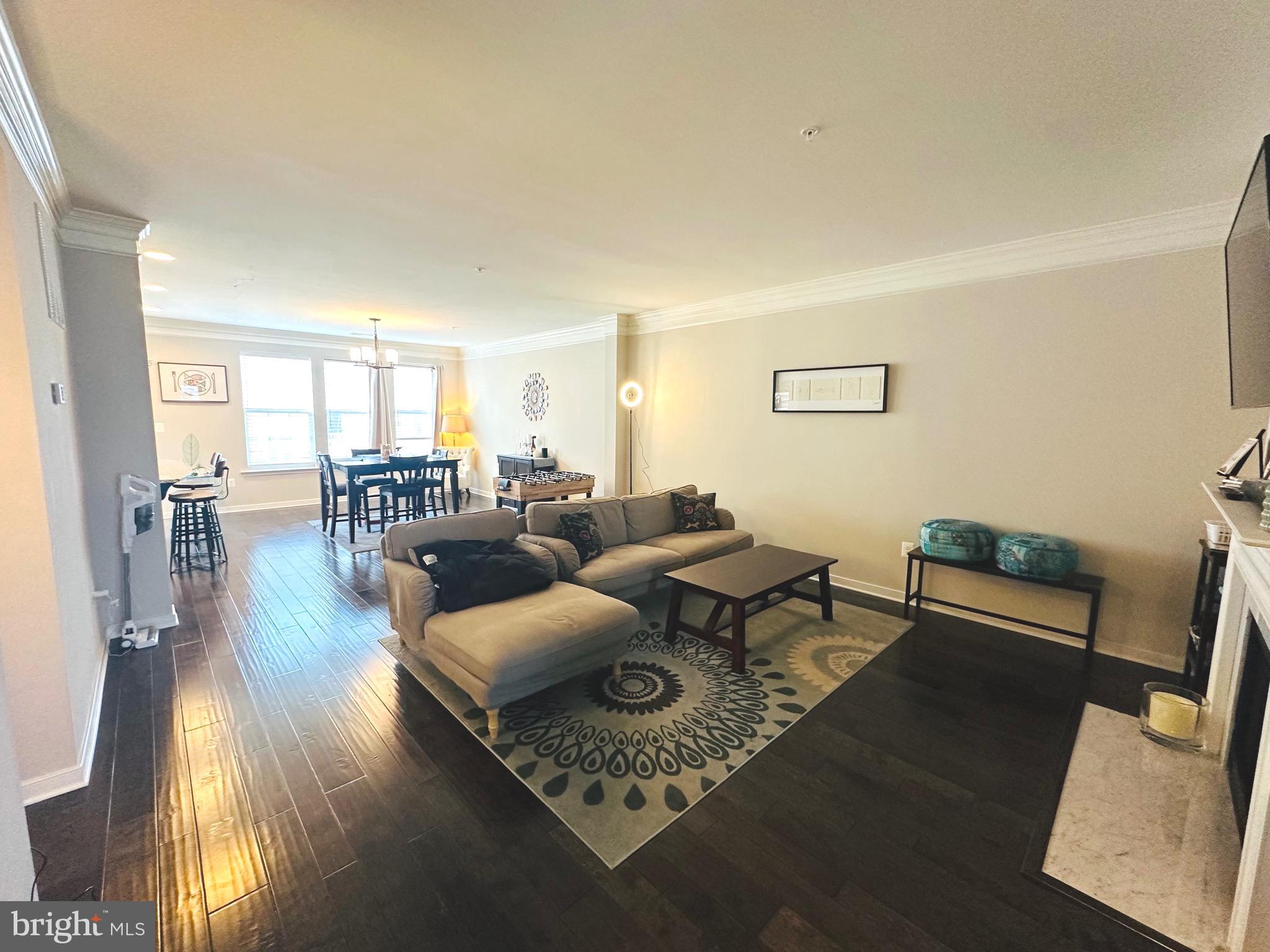 25576 Tolar Square Chantilly, VA 20152 - Photo 13 of 55 a living room with furniture and a table