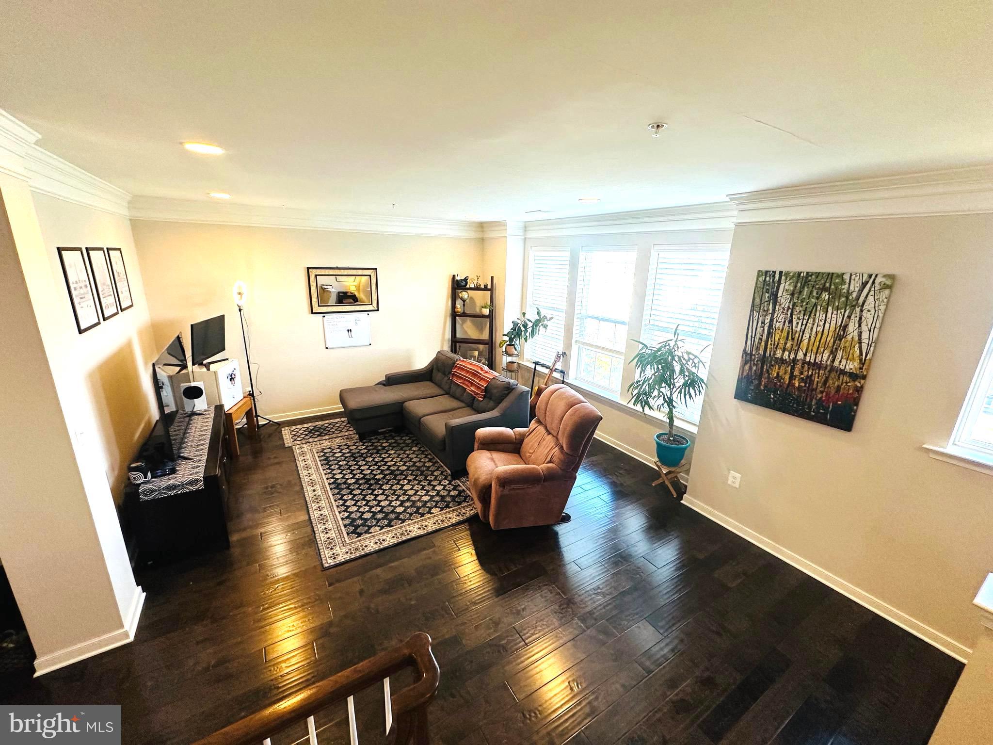 25576 Tolar Square Chantilly, VA 20152 - Photo 17 of 55 a living room with furniture and a large window
