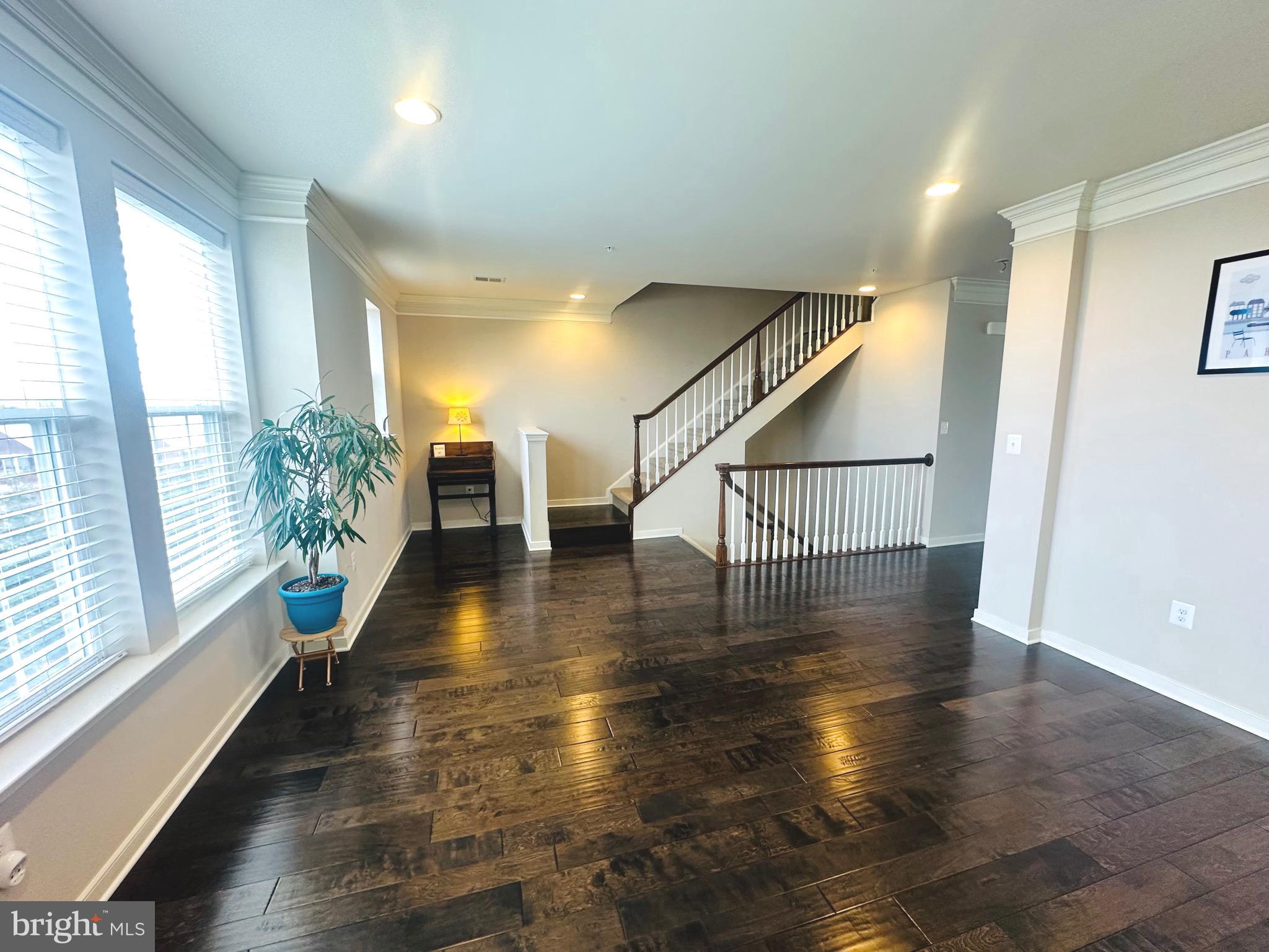 25576 Tolar Square Chantilly, VA 20152 - Photo 20 of 55 a view of an entryway with wooden floor