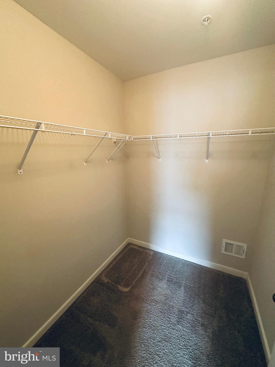 25576 Tolar Square Chantilly, VA 20152 - Photo 32 of 55 a view of a room with racks on the wall