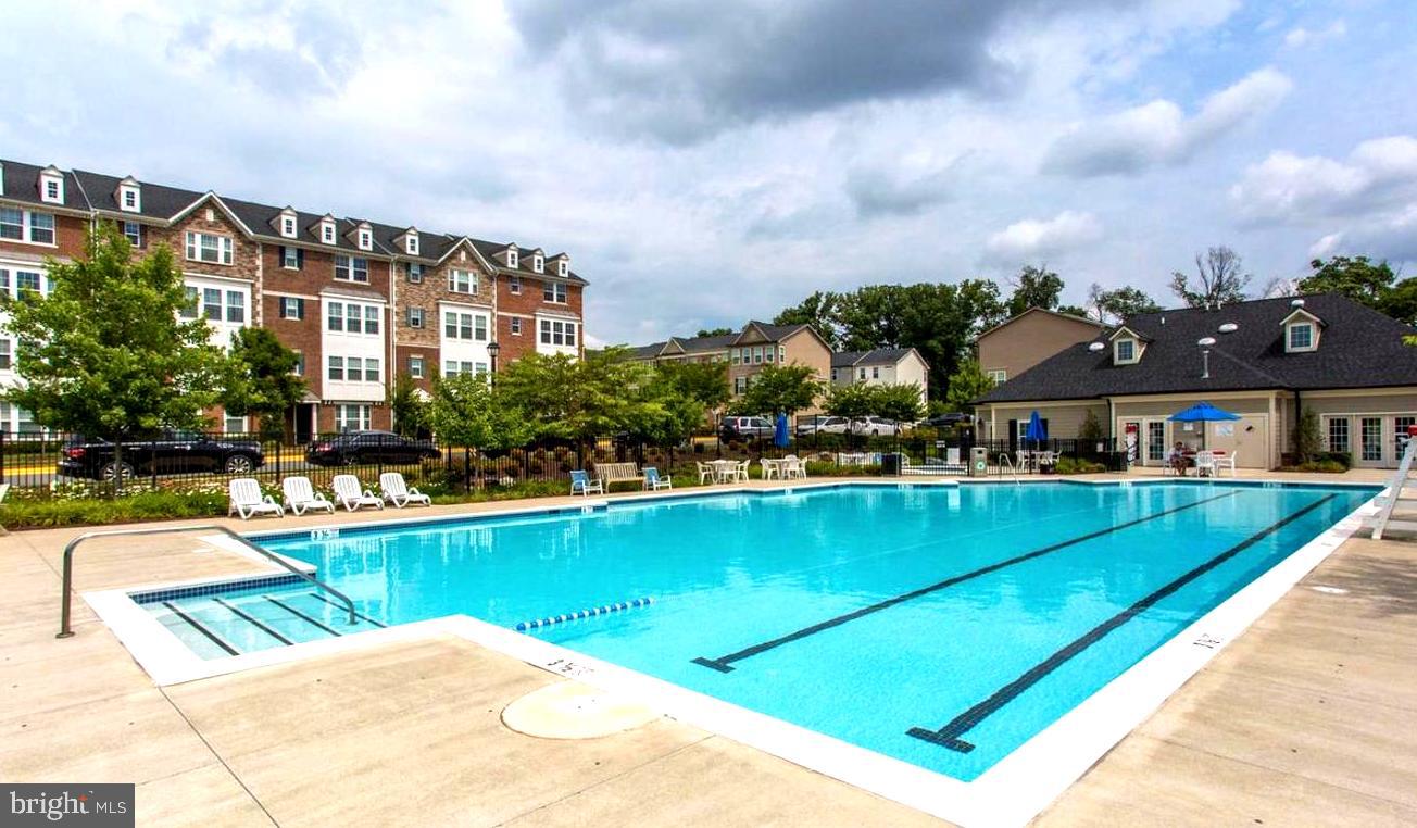 25576 Tolar Square Chantilly, VA 20152 - Photo 52 of 55 a view of swimming pool with outdoor seating and city view