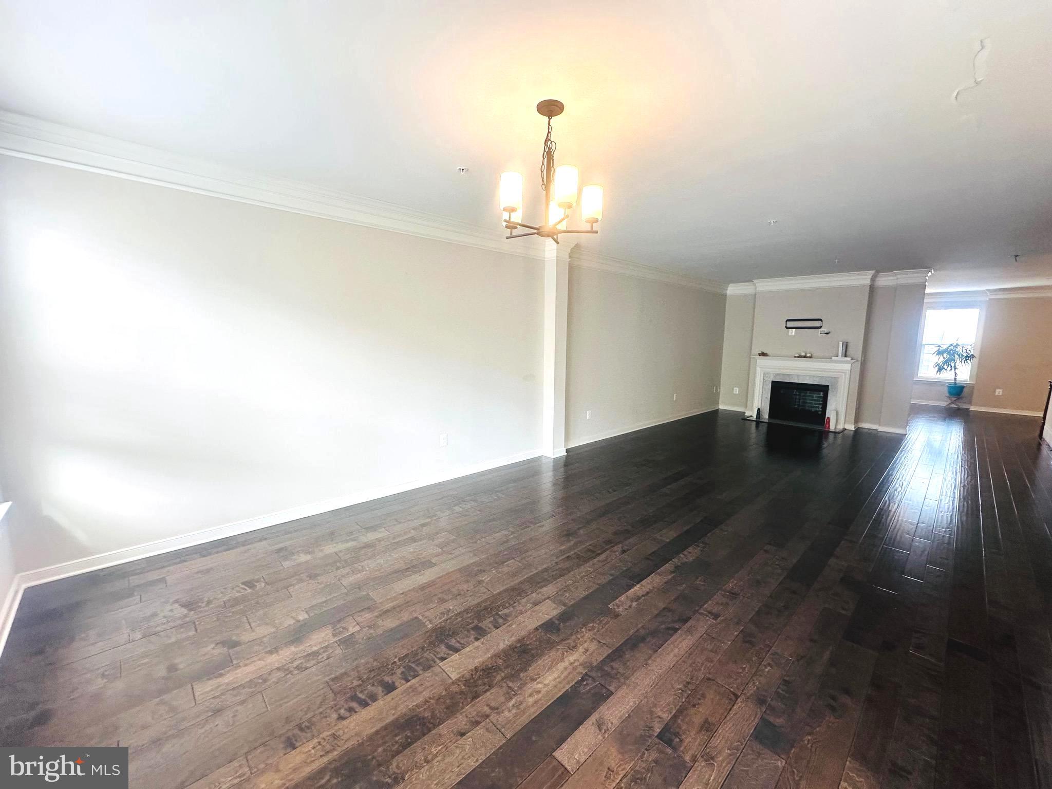 25576 Tolar Square Chantilly, VA 20152 - Photo 8 of 55 a view of empty room with wooden floor