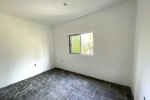 an empty room with a window