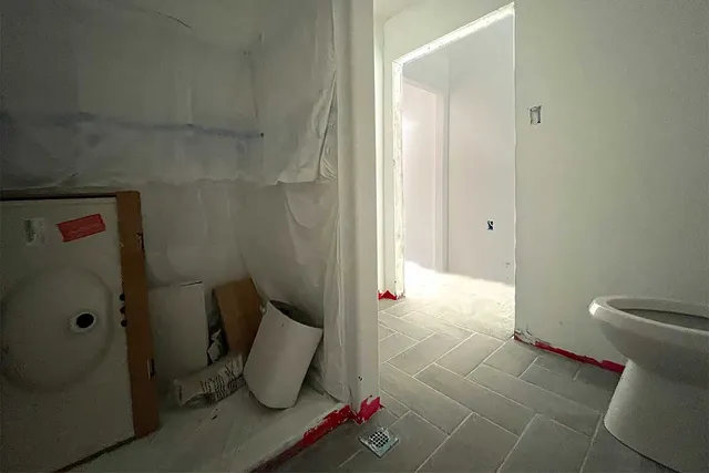 a bathroom with a sink and toilet