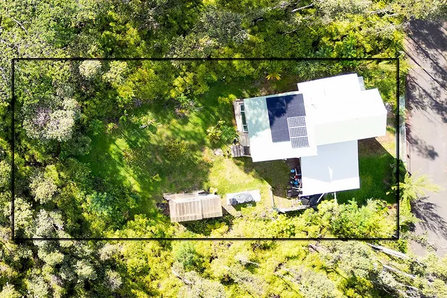 an aerial view of a house having swimming pool
