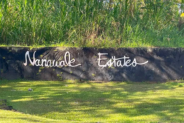 a view of swimming pool with a yard