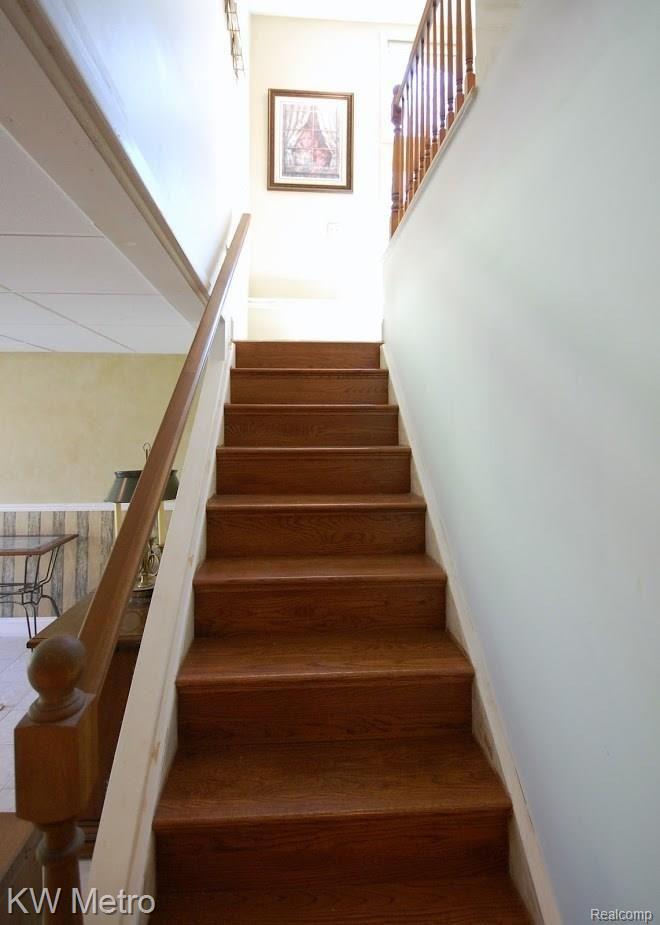 70600 Dequindre Road Romeo, MI 48065 - Photo 20 of 25 Dequindre Stairway to Walk-Out Finished Lower Level