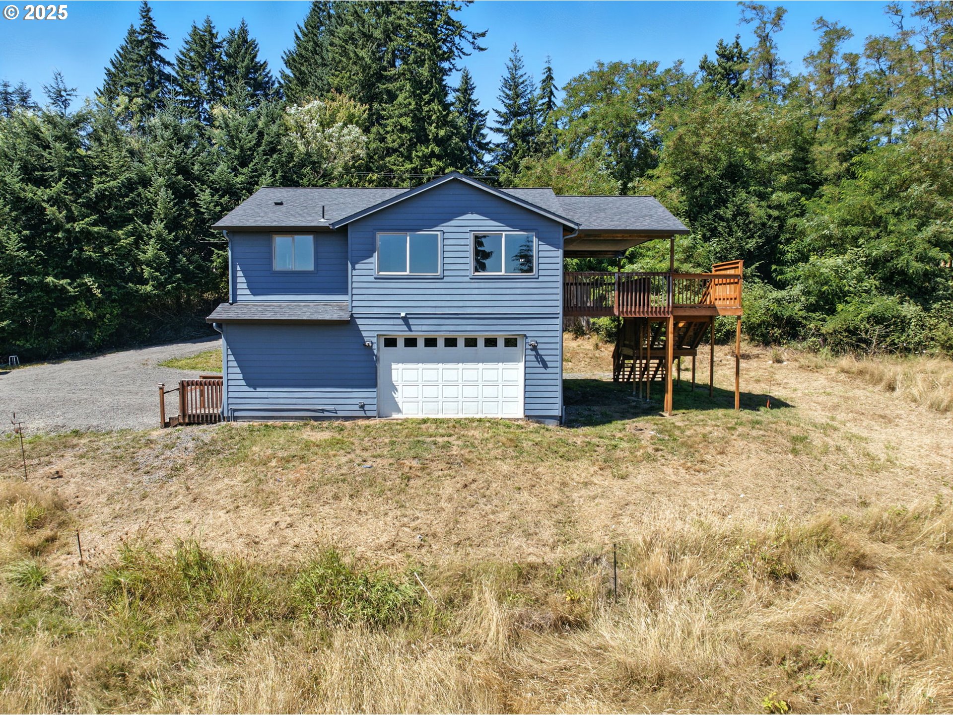 70292 Walker Road Rainier, OR 97048 - Photo 29 of 40 a front view of a house with a yard