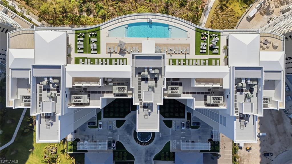 13945 Old Coast Road, Unit 803 Naples, FL 34110 - Photo 28 of 37 an open kitchen view with couple of stainless steel appliances