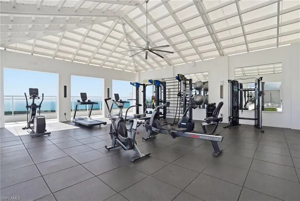 a room with lots of gym equipment