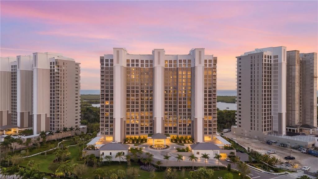 13945 Old Coast Road, Unit 803 Naples, FL 34110 - Photo 4 of 37 a view of a city with tall buildings