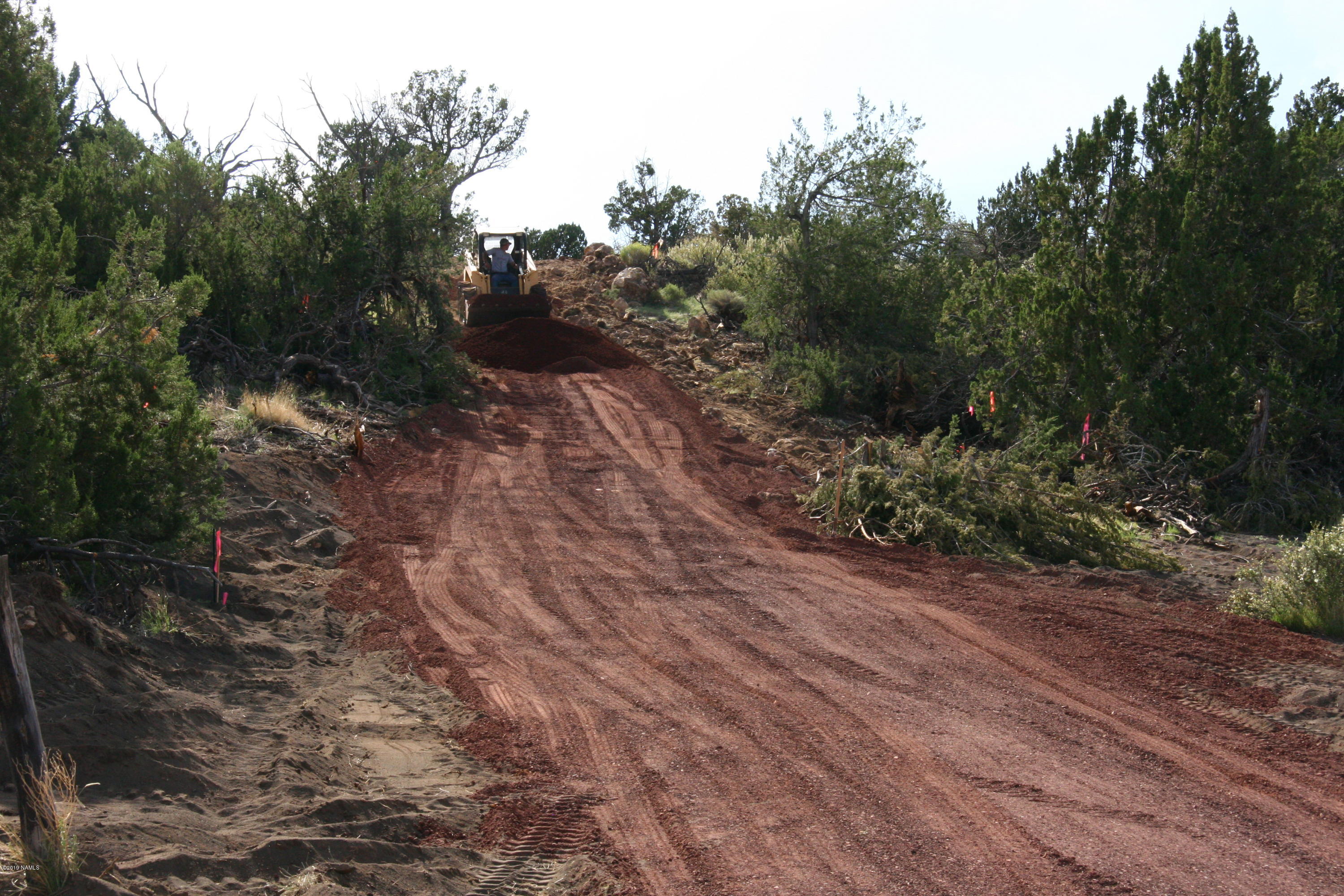 12899 Stockmens Road Flagstaff, AZ 86038 - Photo 26 of 26 a view of a road with trees in the background
