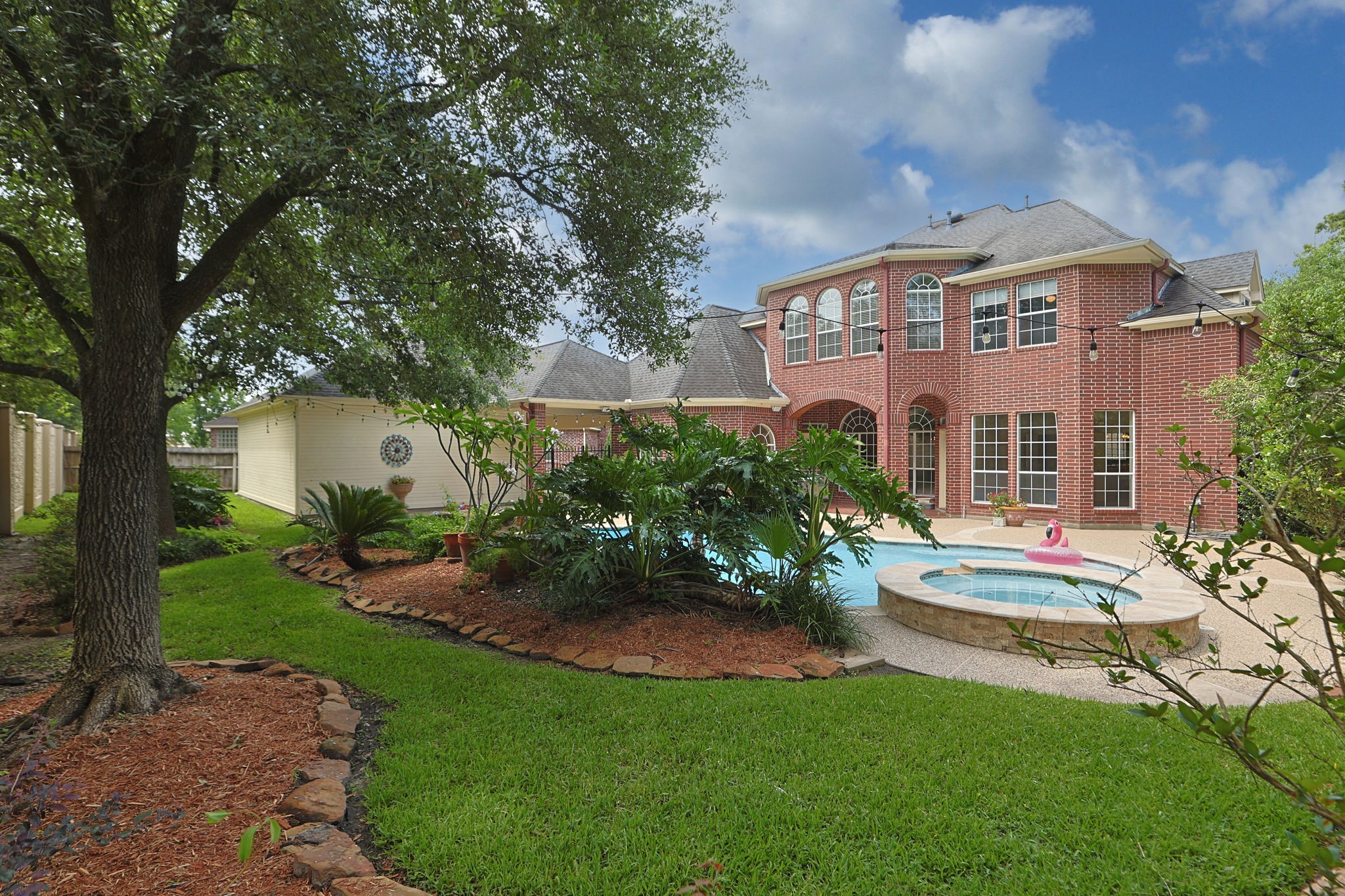 18310 Pamela Way Spring, TX 77379 - Photo 38 of 42 Large lot with beautiful landscape, pool and hot tub.