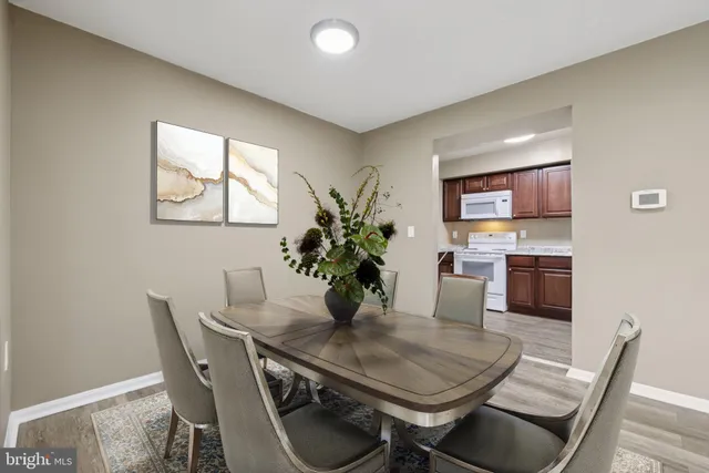 a view of a dining room with furniture