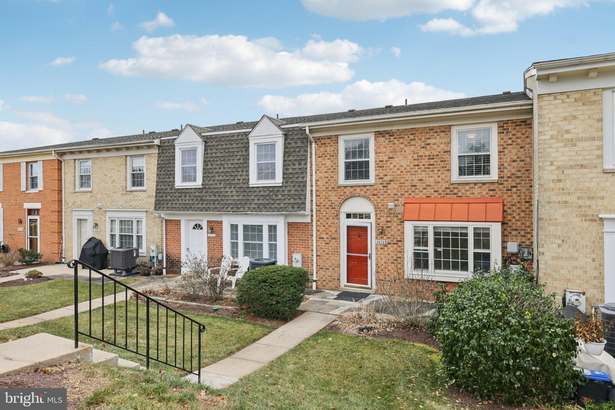 9075 North Laurel Road, Unit E Laurel, MD 20723 - Photo 2 of 28 front view of house with a yard