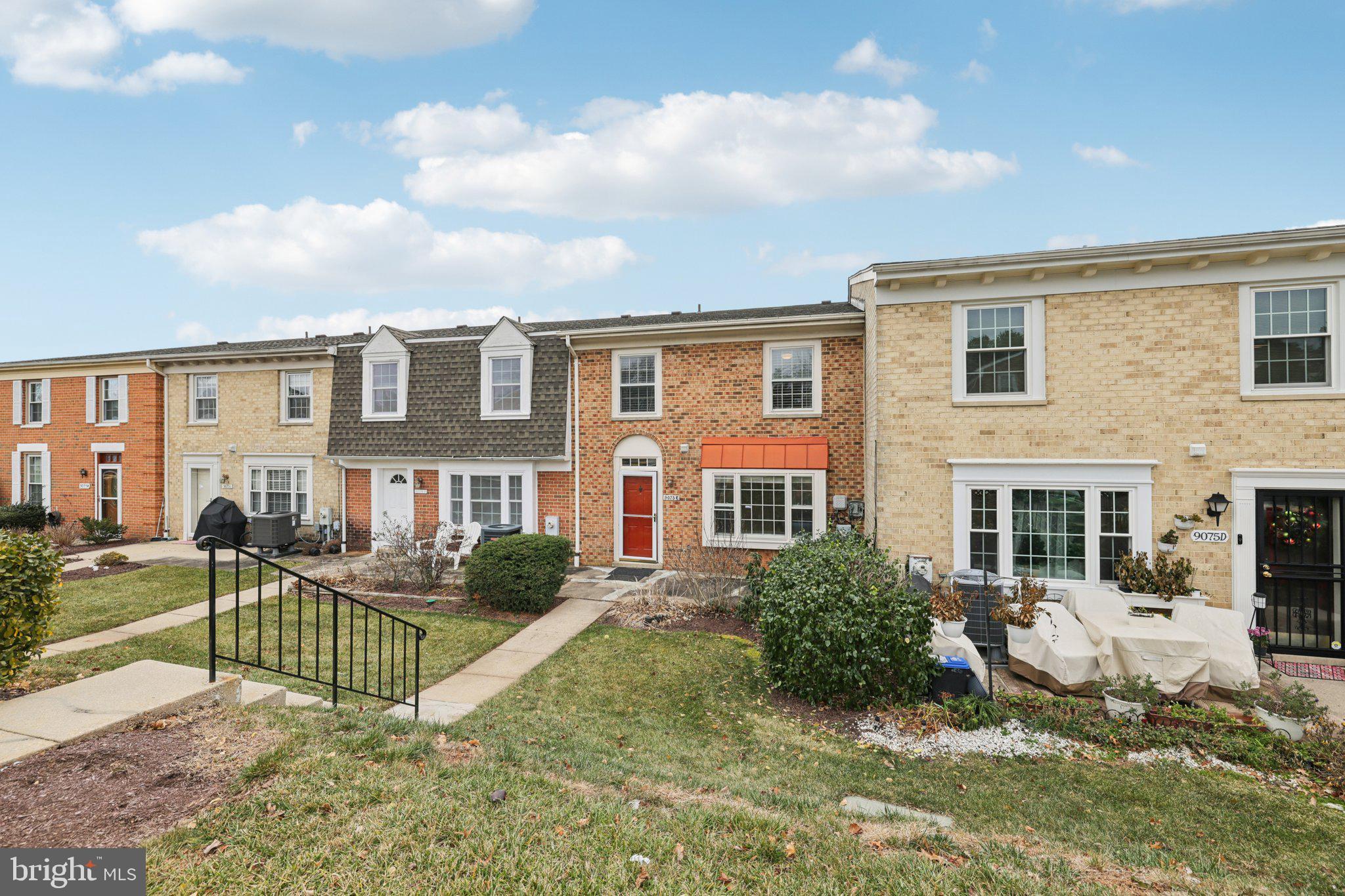 9075 North Laurel Road, Unit E Laurel, MD 20723 - Photo 3 of 28 a view of a house with a patio