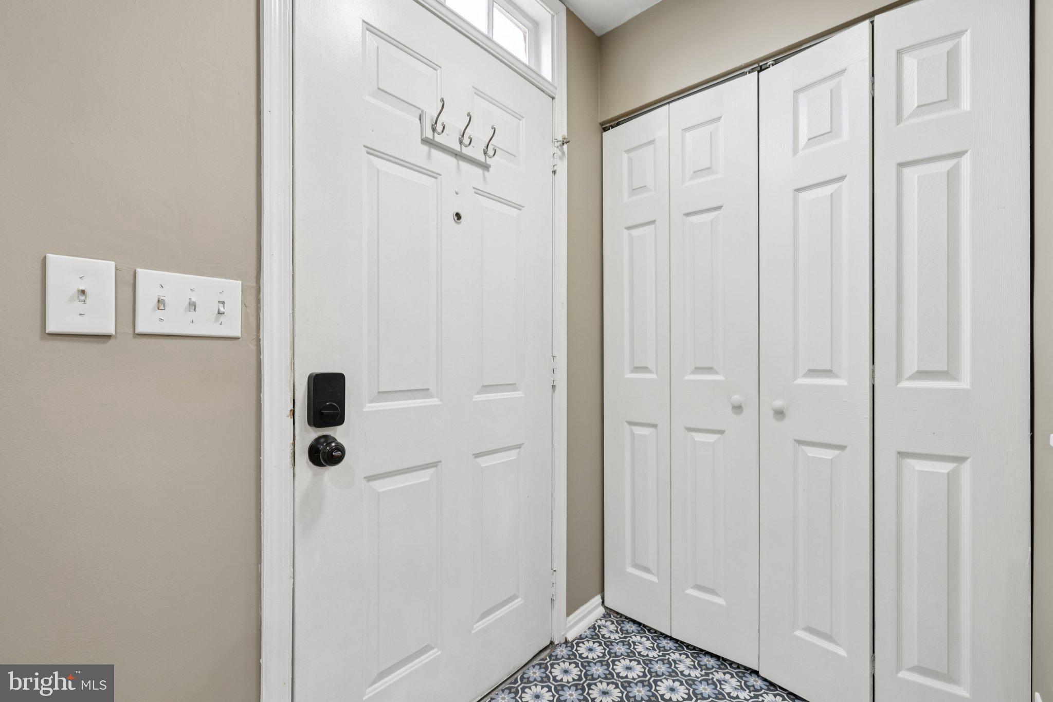 9075 North Laurel Road, Unit E Laurel, MD 20723 - Photo 6 of 28 a bathroom with a shower