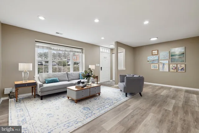 a living room with furniture and window