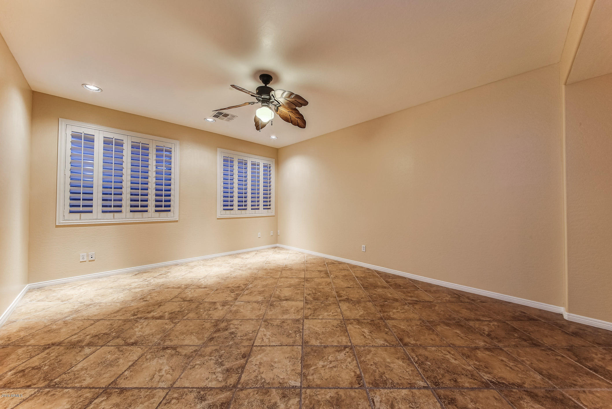 4657 East Reins Road Gilbert, AZ 85297 - Photo 66 of 95 252-Basement_LivingRoom_1jpg