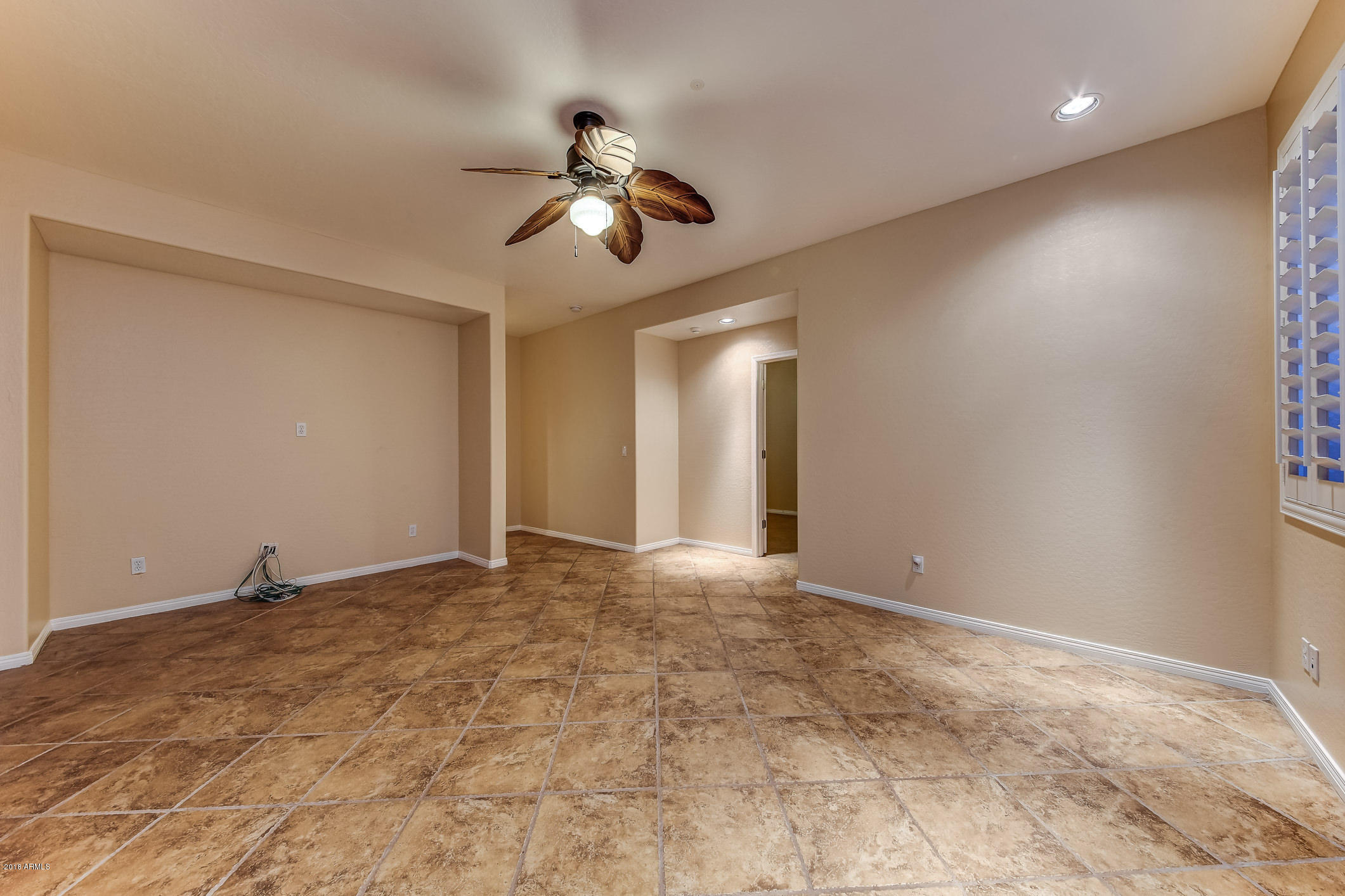 4657 East Reins Road Gilbert, AZ 85297 - Photo 67 of 95 253-Basement_LivingRoom_2