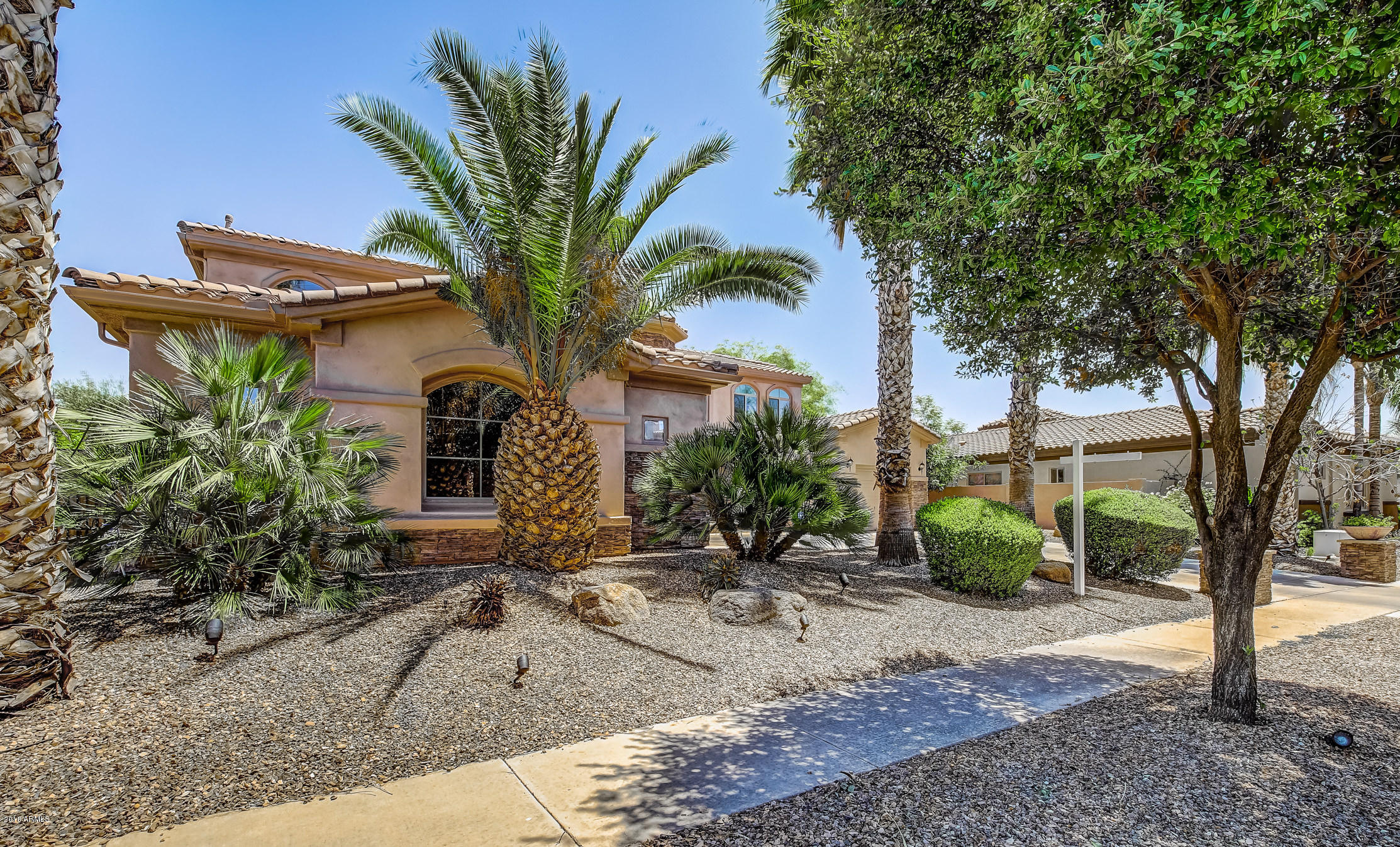 4657 East Reins Road Gilbert, AZ 85297 - Photo 72 of 95 302-FrontExterior_Left