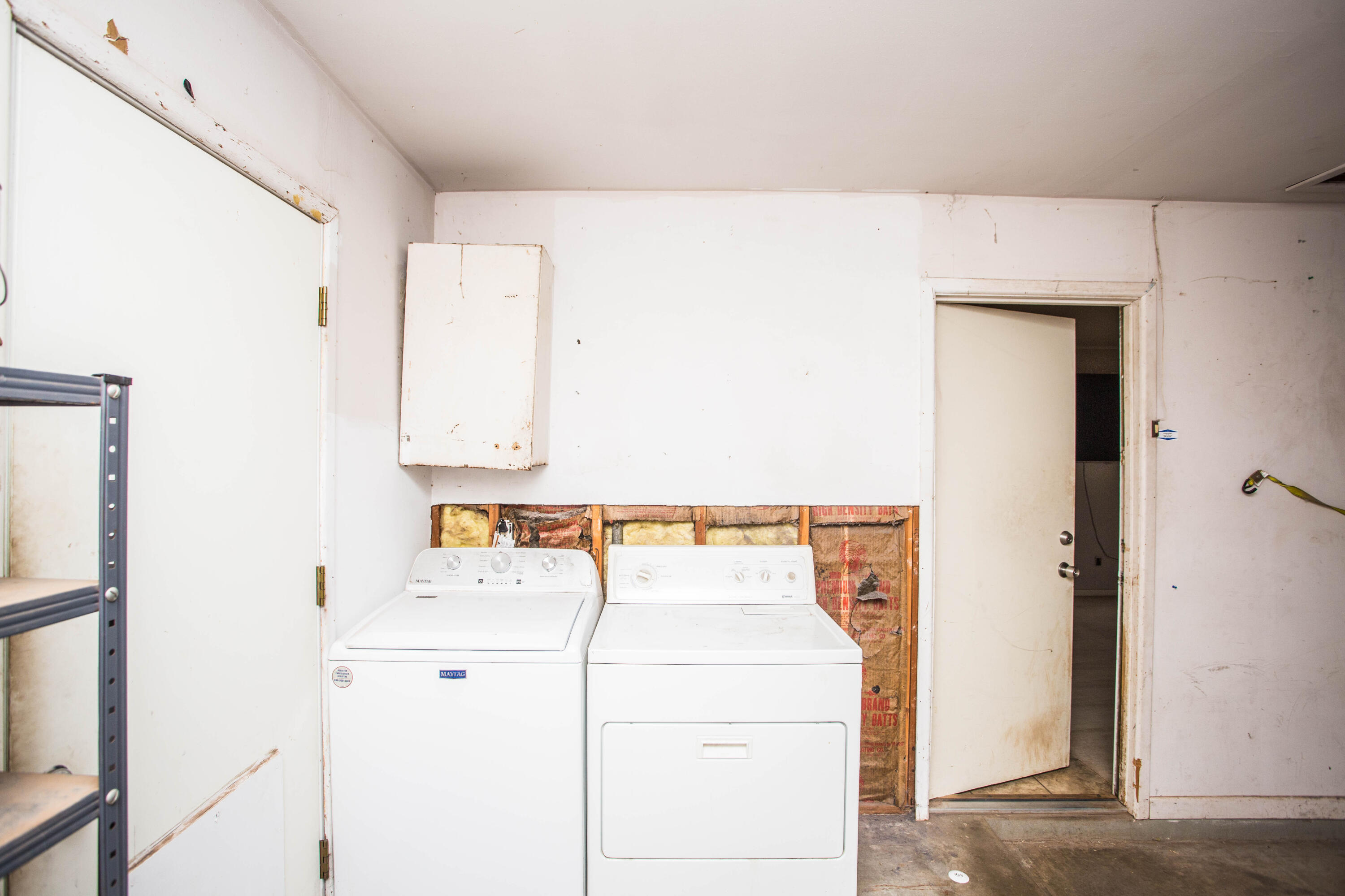 4932 9th Street Lubbock, TX 79416 - Photo 26 of 29 a utility room with dryer and washer