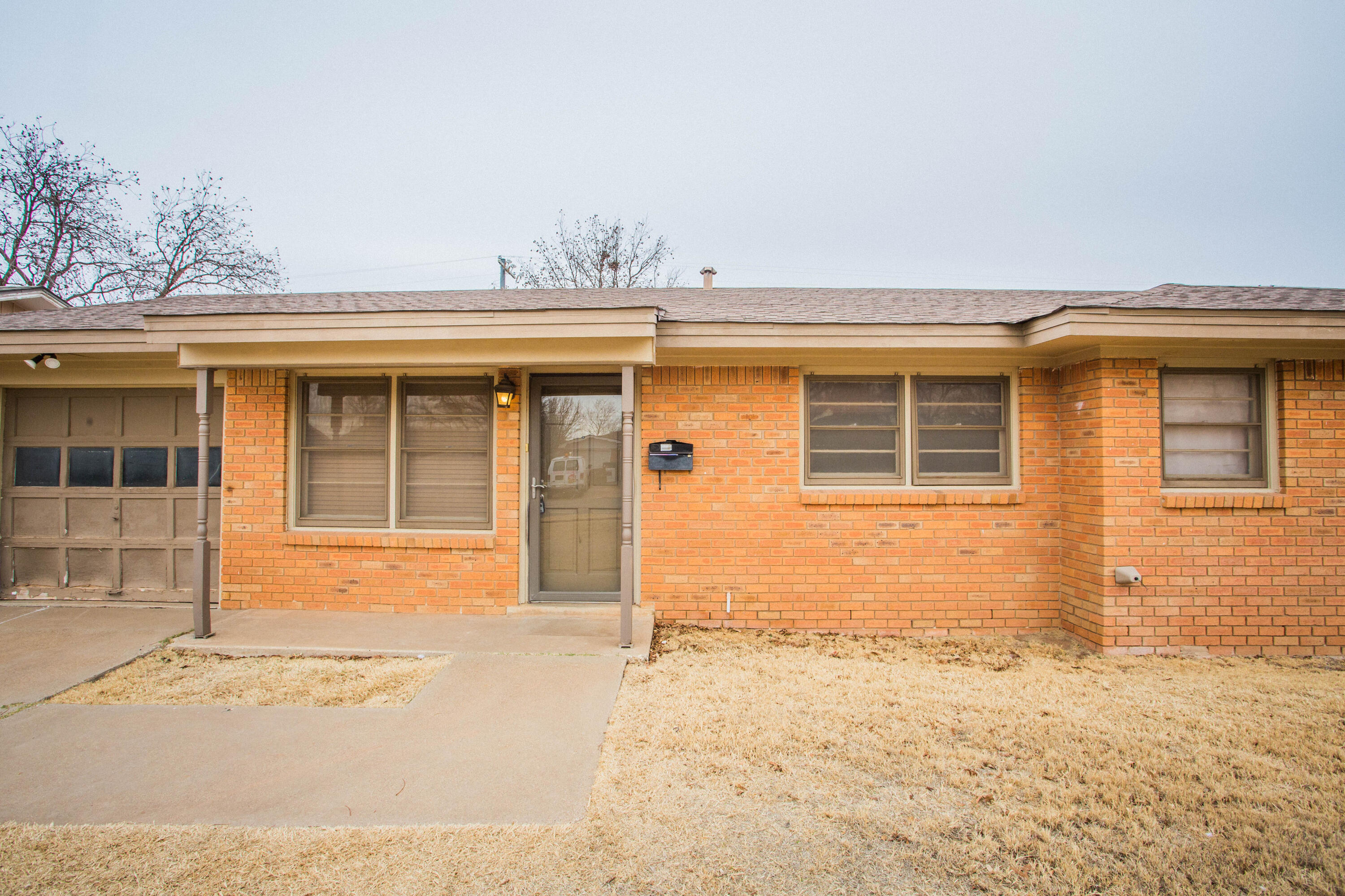 4932 9th Street Lubbock, TX 79416 - Photo 3 of 29 a view of a house with a outdoor space