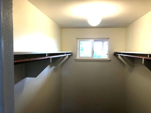 a view of a room with windows