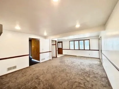 a view of an empty room with window