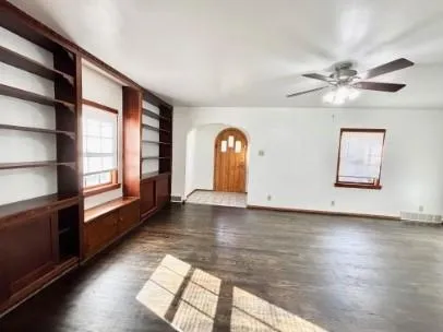 a view of entryway with wooden floor