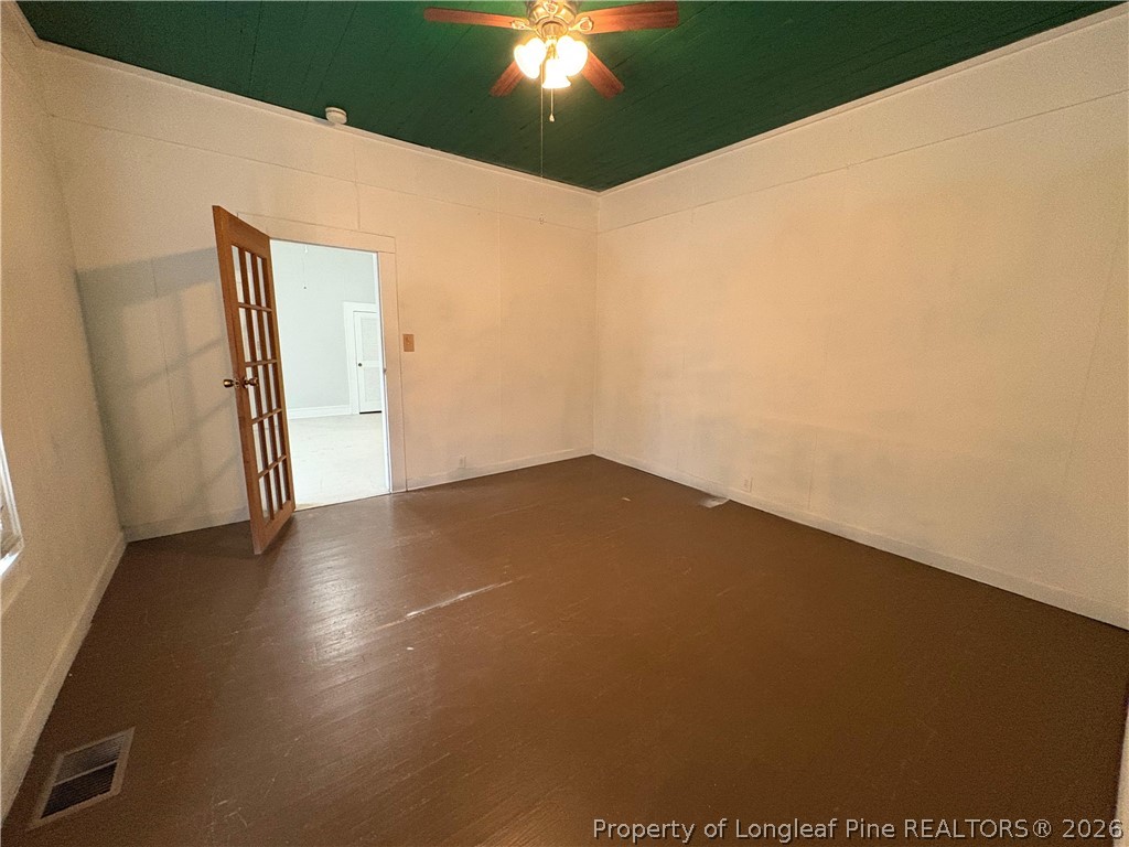 3174 Lindsay Road Raeford, NC 28376 - Photo 19 of 28 a view of an empty room and window