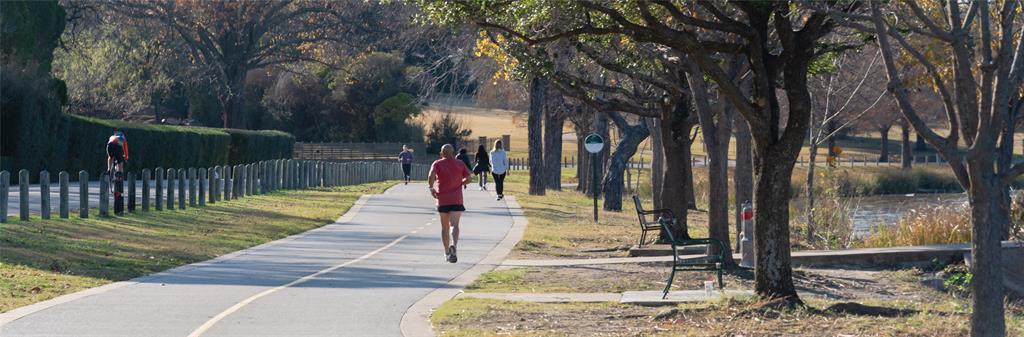 9443 Waterview Road Dallas, TX 75218 - Photo 24 of 34 runner on the trail