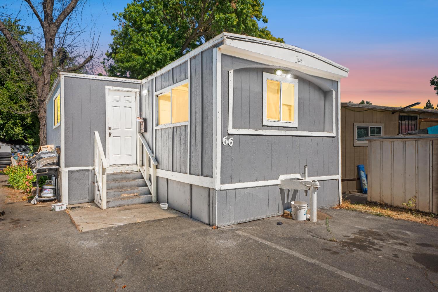 710 Glide Avenue, Unit 66 West Sacramento, CA 95691 - Photo 2 of 12 a view of a house with backyard and porch