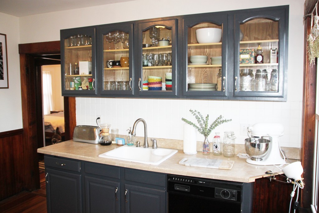 a bathroom with a sink double vanity and a mirror