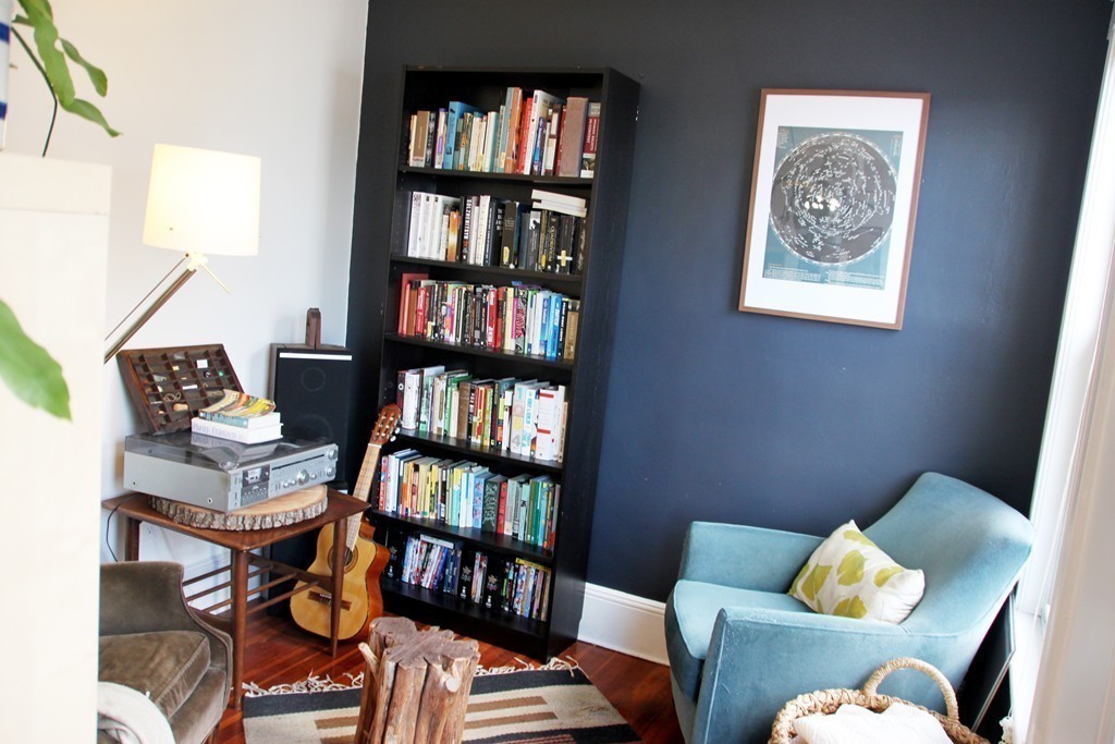80 Aldrich Street, Unit 2 Boston, MA 02131 - Photo 12 of 20 a living room with furniture and a book shelf