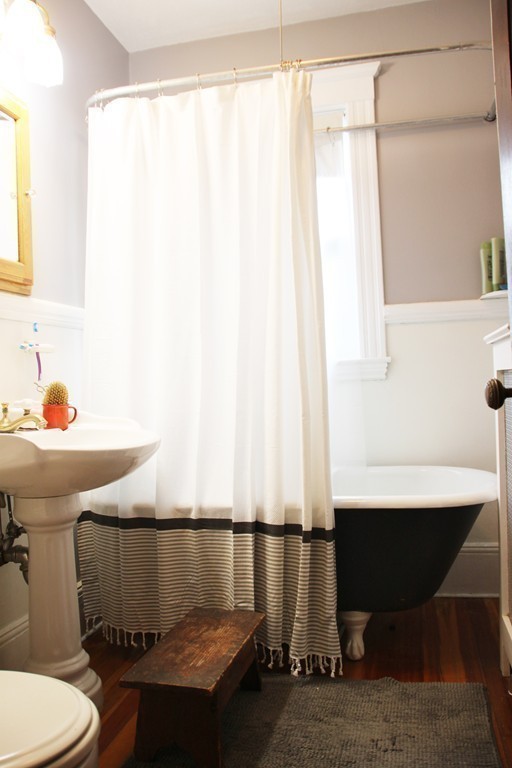 80 Aldrich Street, Unit 2 Boston, MA 02131 - Photo 18 of 20 a bathroom with a sink and a mirror