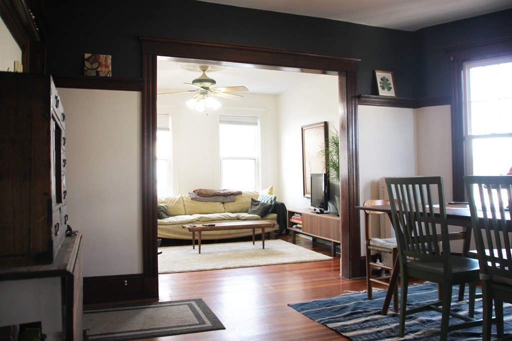 80 Aldrich Street, Unit 2 Boston, MA 02131 - Photo 6 of 20 a view of a living room and dining room