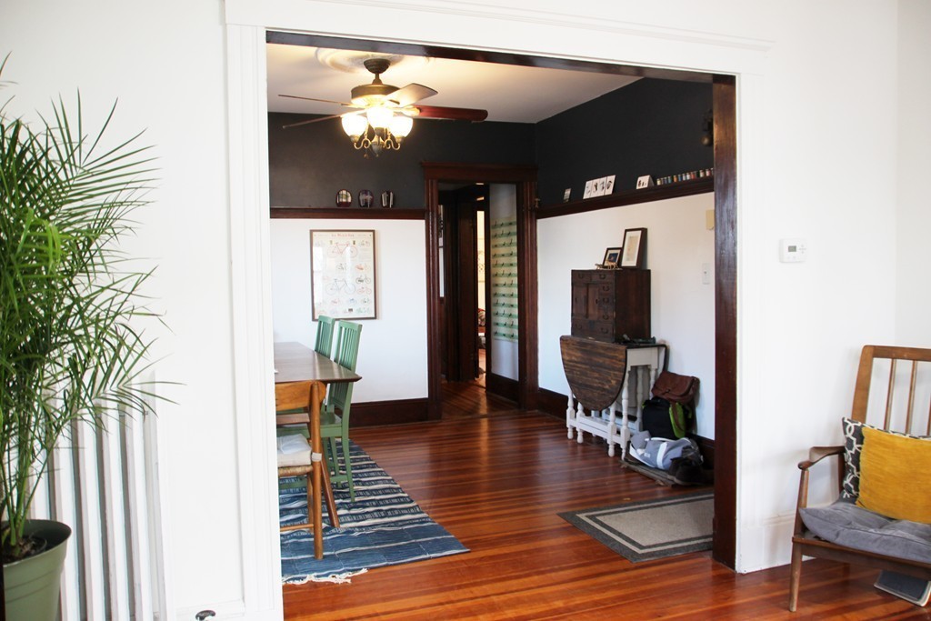 80 Aldrich Street, Unit 2 Boston, MA 02131 - Photo 8 of 20 a view of living room with furniture and a flat screen tv