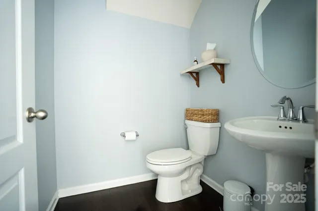 a bathroom with a toilet and a sink