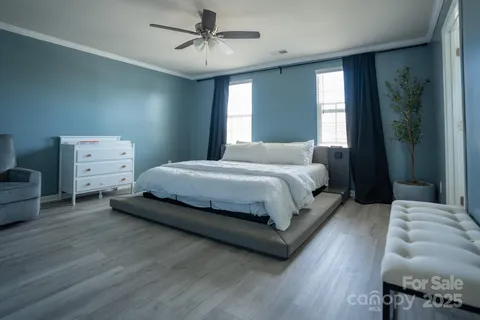 a bedroom with a bed and furniture