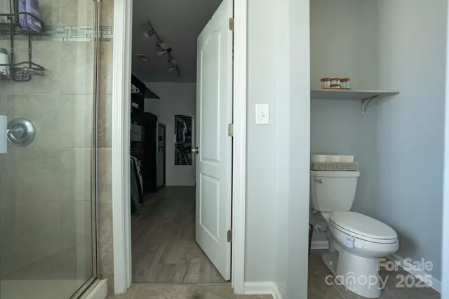 a bathroom with a toilet and a sink
