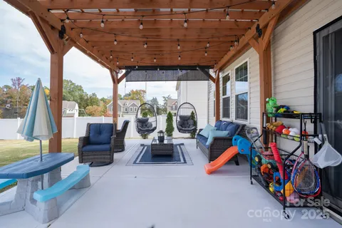 a view of living room with porch and furniture