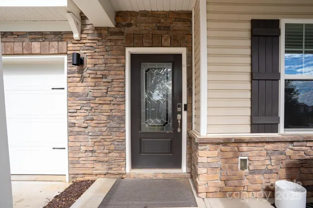 a front view of a house with a door
