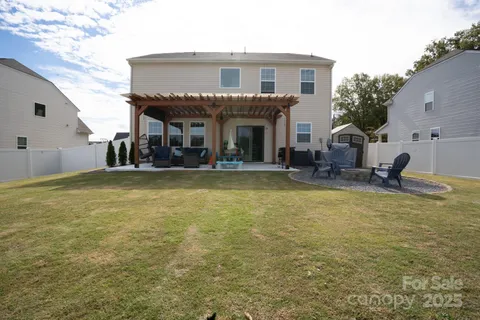 a front view of a building with garden