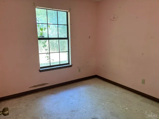 an empty room with a window