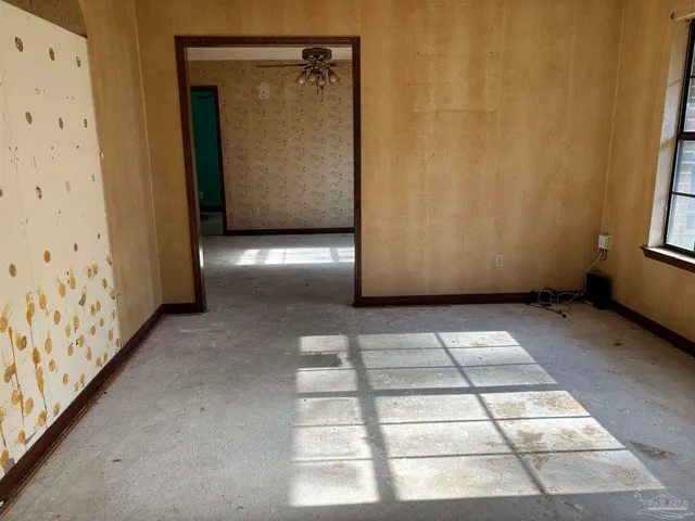 a view of an empty room and window